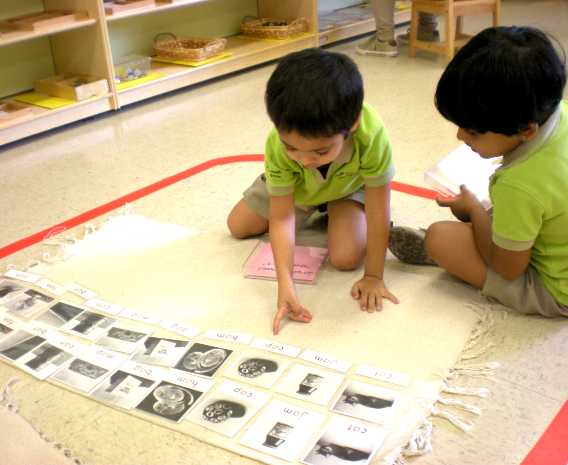 Primary program students learning at Montessori Ivy League Academy